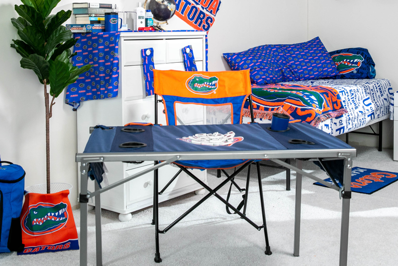 Illustration for article titled We Challenged Two Guys To Decorate A Dorm Room Using Only Fan Merch